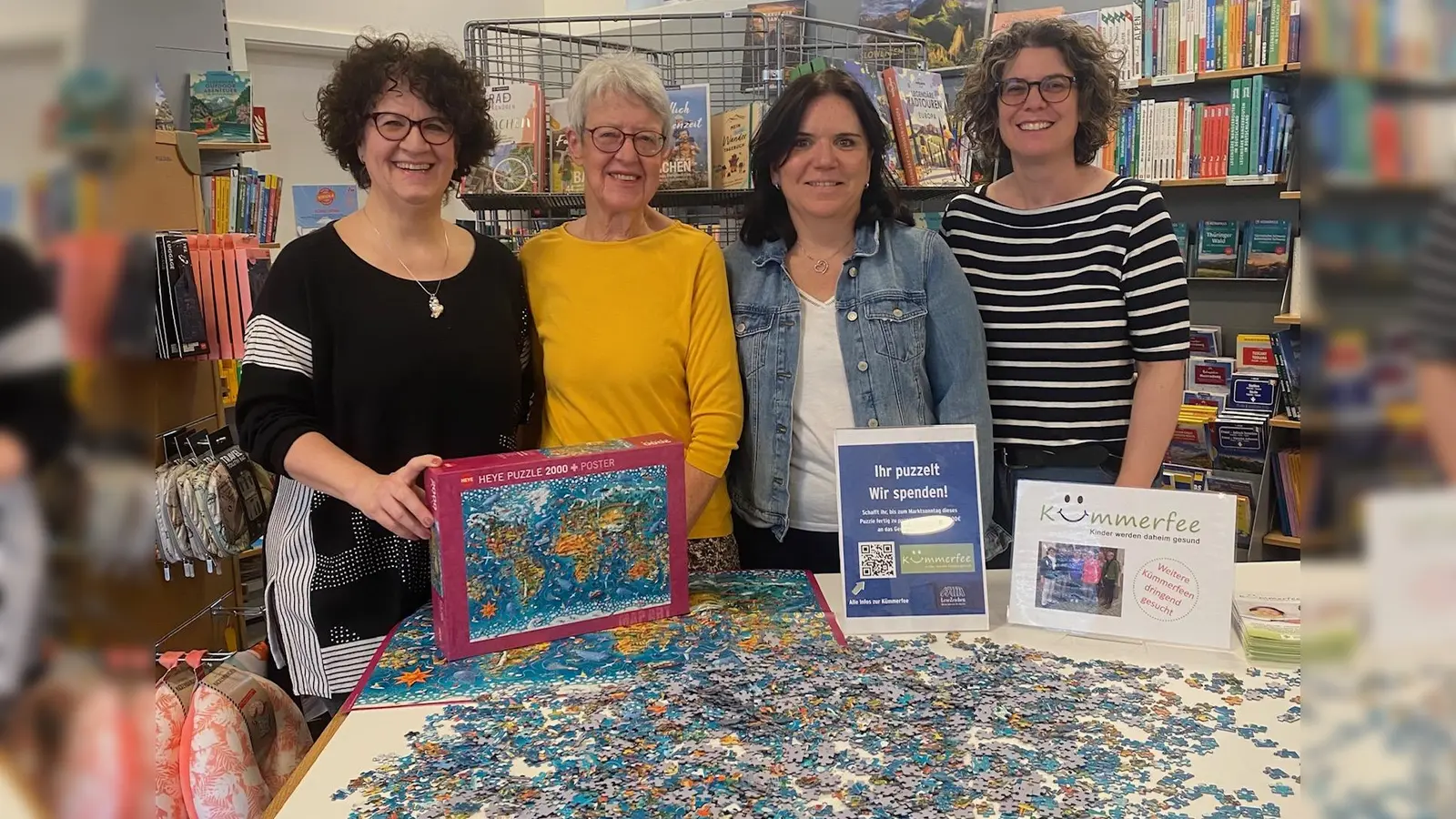 Helen Hoff, Dr. Traudl Jaschul, Simone Hermes und Katrin Schmidt (von links) laden die Germeringer zum Puzzlen ein. (Foto: LeseZeichen)